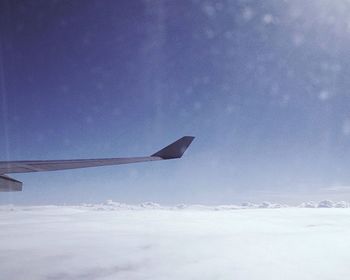 Airplane flying over sea