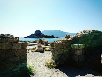 Scenic view of sea against clear blue sky