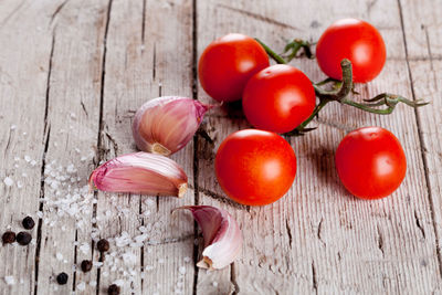 Close-up of tomatoes on wooden table