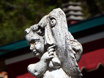 Close-up of statue against blurred background