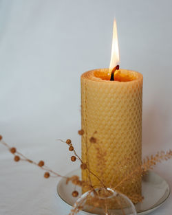 Close-up of illuminated candle