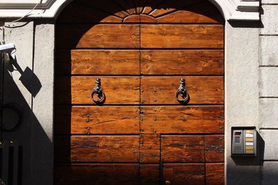 Closed wooden door of building