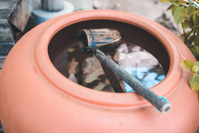 High angle view of metal container on plant