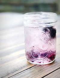 Close-up of ice cream in jar on table