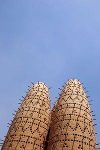 Low angle view of built structure against blue sky