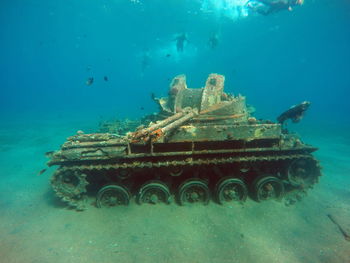 View of an abandoned boat in sea