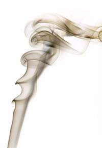 Close-up of smoke against white background