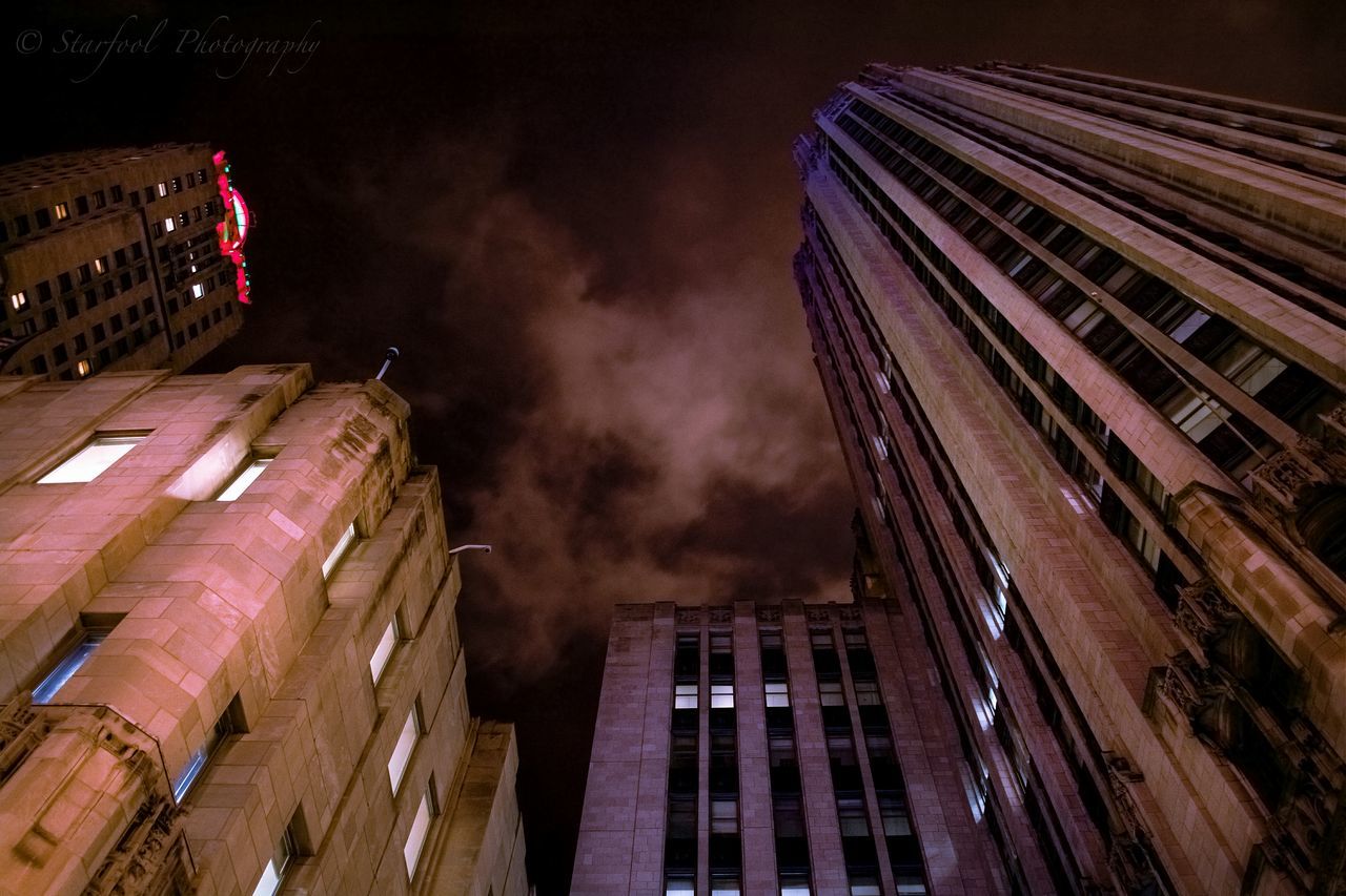 architecture, building exterior, built structure, night, low angle view, city, skyscraper, illuminated, tall - high, building, tower, sky, modern, residential building, office building, residential structure, no people, outdoors, tall, city life