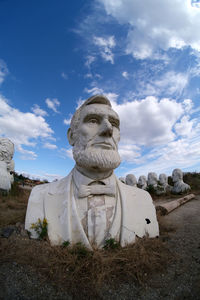 Low angle view of statue against sky