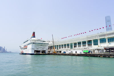 Ship in sea against clear sky