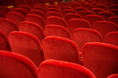 Full frame shot of red empty chairs