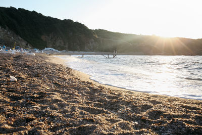 Scenic view of beach against sky