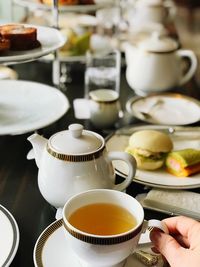 Close-up of afternoon tea set  on table