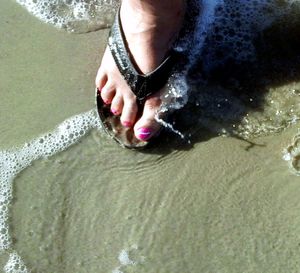 Woman standing in water