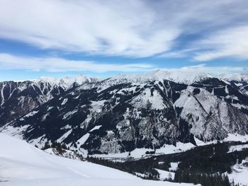 Scenic view of snow covered mountain against sky