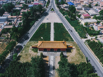 High angle view of street amidst buildings in city