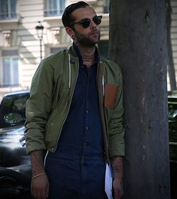 Mid adult man wearing sunglasses standing outdoors