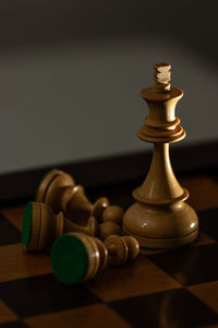 Close-up of chess pieces on table
