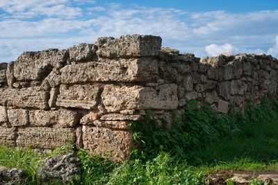 Old stone wall against sky