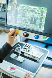 Close-up of person working on table