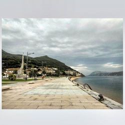 View of river against cloudy sky