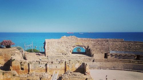 View of fort against blue sea