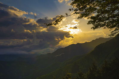 Scenic view of dramatic sky during sunset