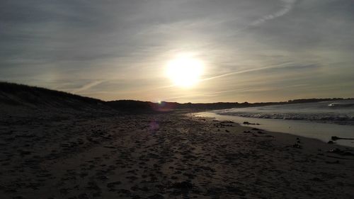 Scenic view of sea at sunset