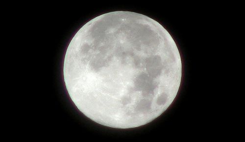 Low angle view of moon in sky