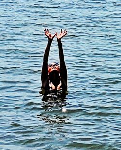 Full length of man swimming in water