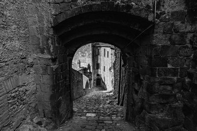 Man walking in tunnel