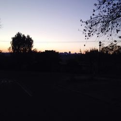 Scenic view of landscape against sky at sunset