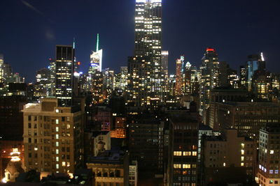 Illuminated cityscape at night