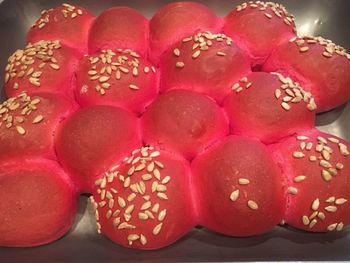 High angle view of pink candies on table