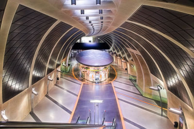 Digital composite image of escalator in subway station