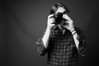 Portrait of man photographing