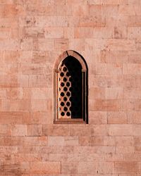 Low angle view of window on wall