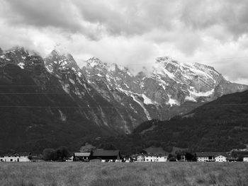 Scenic view of snowcapped mountains against sky