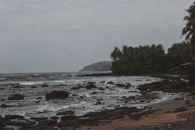 Scenic view of beach and sea against sky