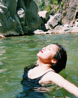 Woman standing in water