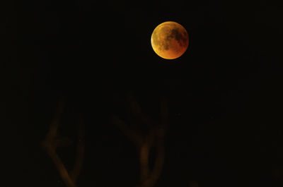 Scenic view of moon against sky at night