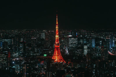 Illuminated buildings in city at night