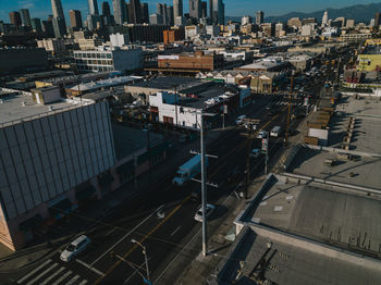 High angle view of street amidst buildings in city