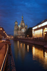 Illuminated buildings at waterfront