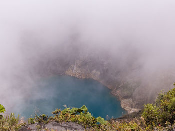 Smoke emitting from volcanic mountain