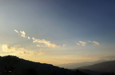 Low angle view of silhouette mountain against sky during sunset