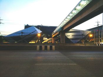 Illuminated bridge against sky