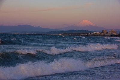 Scenic view of sea against sky during sunset