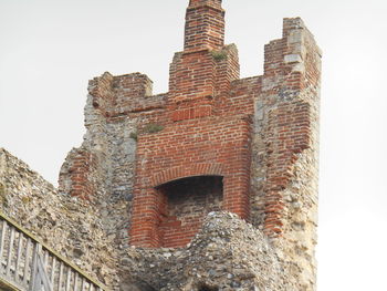 Low angle view of built structure against clear sky