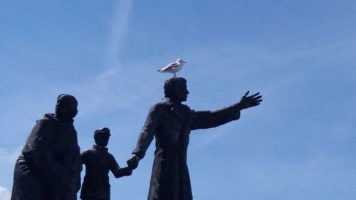 Low angle view of statue against clear sky